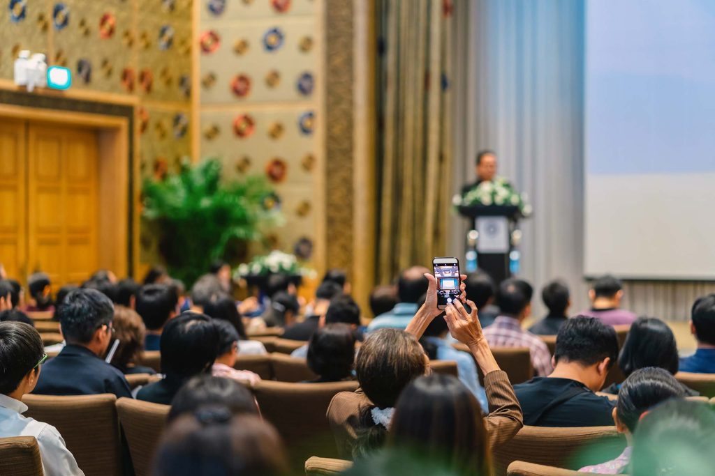 back-side-of-audience-taking-photo-by-cellphone-th-3PQC8CB.jpg