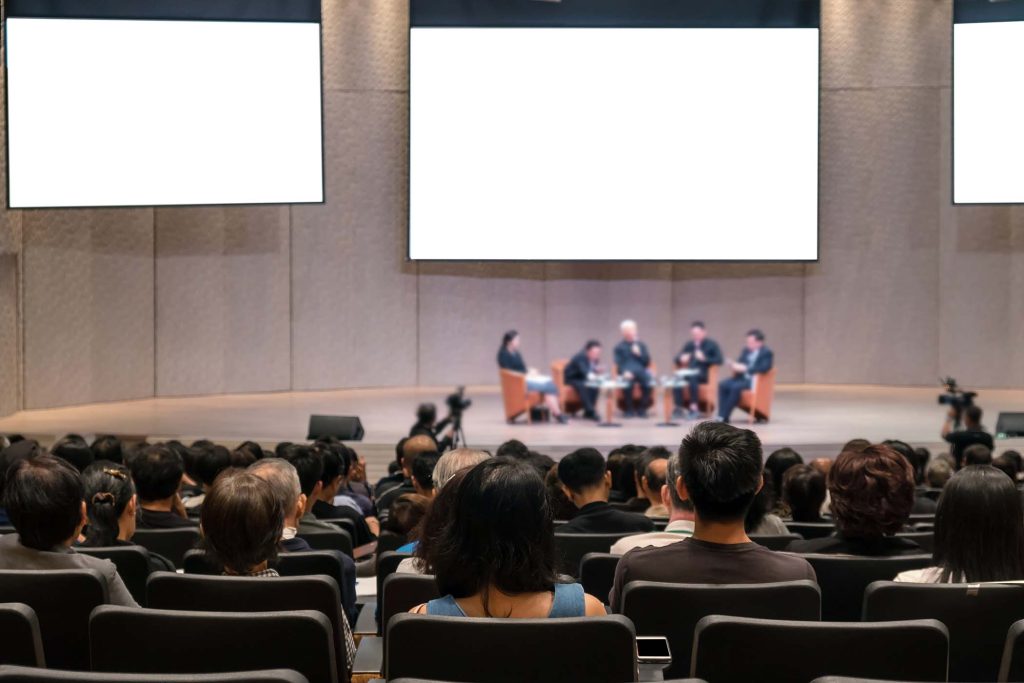 rear-view-of-audience-over-the-speakers-on-the-sta-ZNWZ8FT.jpg